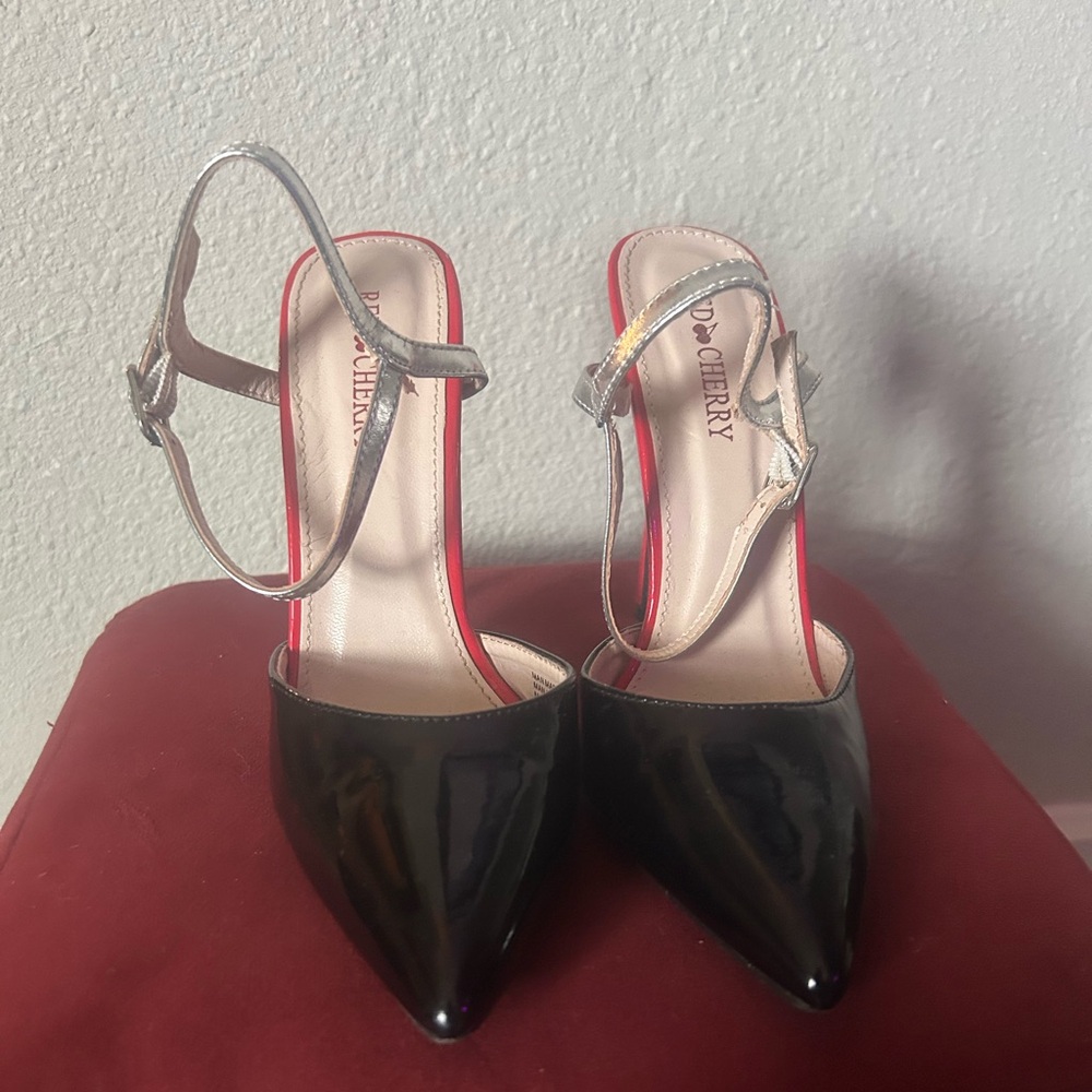 BCBGeneration Black and Silver Heels